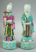 A PAIR OF 18TH CENTURY CHINESE PORCELAIN IMMORTAL FIGURES, both approx. 23cm high.