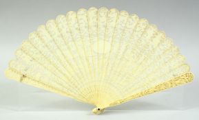 A CHINESE CANTON CARVED AND PIERCED IVORY FAN, boxed, 19cm long.