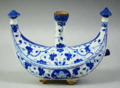 A TURKISH IZNIK GLAZED POTTERY WATER JUG, 20.5cm long.