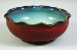 A CHINESE PETAL SHAPE JUN WARE BOWL, 19.5cm diameter.
