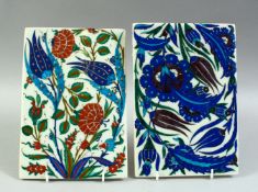 TWO TURKISH IZNIK TILES, each with floral decoration, both 24cm x 16.5cm.