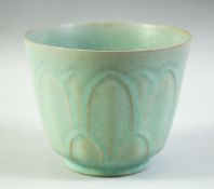 A CHINESE CELADON PORCELAIN PLANT POT, 12cm high.