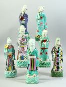 SEVEN 18TH CENTURY CHINESE PORCELAIN IMMORTAL FIGURES, each approx. 24cm high, (7).