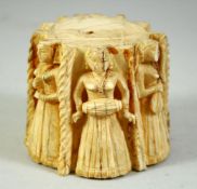 A FINE 18TH CENTURY INDIAN CARVED BONE STAND, depicting female musicians and dancers, 7cm high.