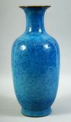 A GOOD CHINESE FLAMBE BLUE GLAZED POTTERY VASE, the base with incised six character mark, 35.5cm