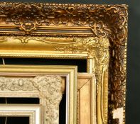 A 19th Century continental gilt composition frame, rebate 15.75