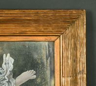 An early 20th Century frame with wavy decoration, 22