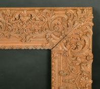 A highly carved 20th Century frame, rebate size 20