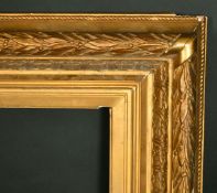 An early 20th Century gilt composition frame, rebate size 20