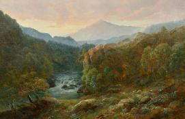 Thomas Finchett (1858-1931) British, A wooded river landscape with sheep grazing and mountains
