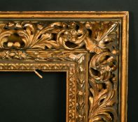 A 19th Century Continental frame with carved foliate scrolling decoration, rebate size 6.75