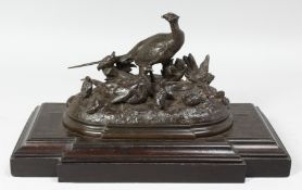 Jules Moigniez (1835-1894) French, a family group of Pheasants, patinated bronze, on a stepped