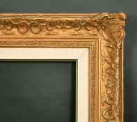 An early 20th Century gilt composition frame, 21.25
