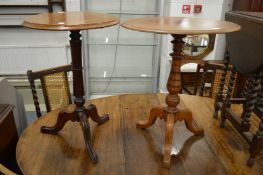 Two Victorian mahogany tripod tables.