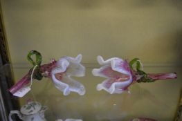 A pair of naturalistic moulded glass vases.