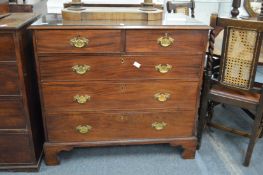 A George III mahogany chest of drawers.