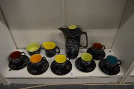 A Crown Devon Harlequin coffee service.