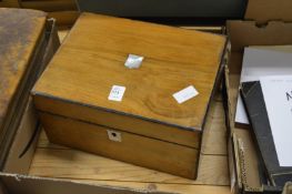 A Victorian walnut writing slope.