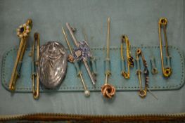 Various bar brooches.