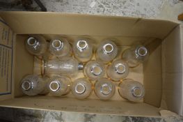 A quantity of etched and gilt decorated glass lampshades.