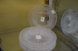 Five cut-glass ice plates.