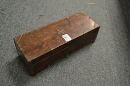A small wooden casket.