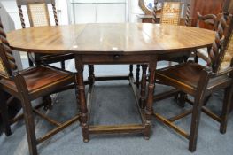 A good large oak drop-leaf gate-leg dining table.