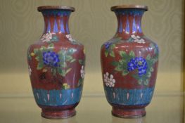 A pair of cloisonne vases.