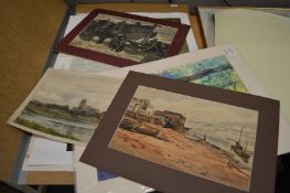 A folder of unframed artwork.