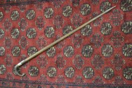 A horn handled walking stick.