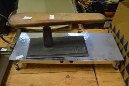 A sleeve ironing board and an electric food warmer.