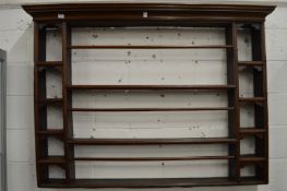 A 19th century oak Delft rack.