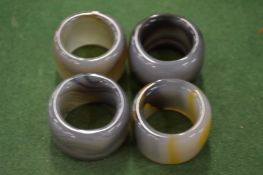 Four jade archer's rings.