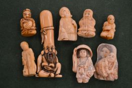 A collection of Japanese ivory netsukes.