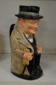 A Royal Doulton Toby jug of Winston Churchill.