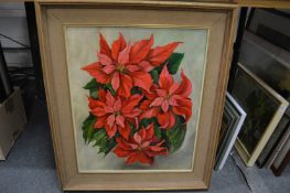 A painting of a Poinsettia and various other pictures.