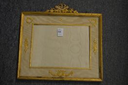 A good ormolu and silk photograph frame.
