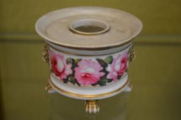 A small Derby inkwell painted with roses.