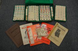 A travelling Mahjong set and other items.