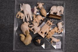 A collection of Japanese ivory small okimonos of elephants and other animals and birds.