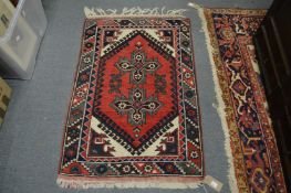 A small Persian style rug.