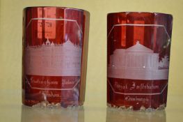 A pair of ruby tinted cut glass Spa beakers.