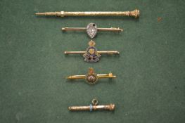 Propelling pencils, bar brooches etc.