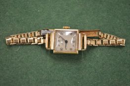 A ladies' 9ct gold wristwatch.