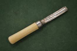 A George III silver travelling apple corer by William Pugh, Birmingham, 1810.