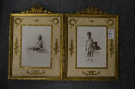 A good ormolu and silk folding double photograph frame.
