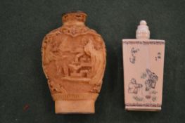 Two Chinese ivory snuff bottles.