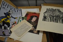 A folder of unframed artwork.