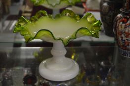 A Victorian green glass and opaque glass comport.
