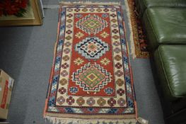 A small Persian style rug.